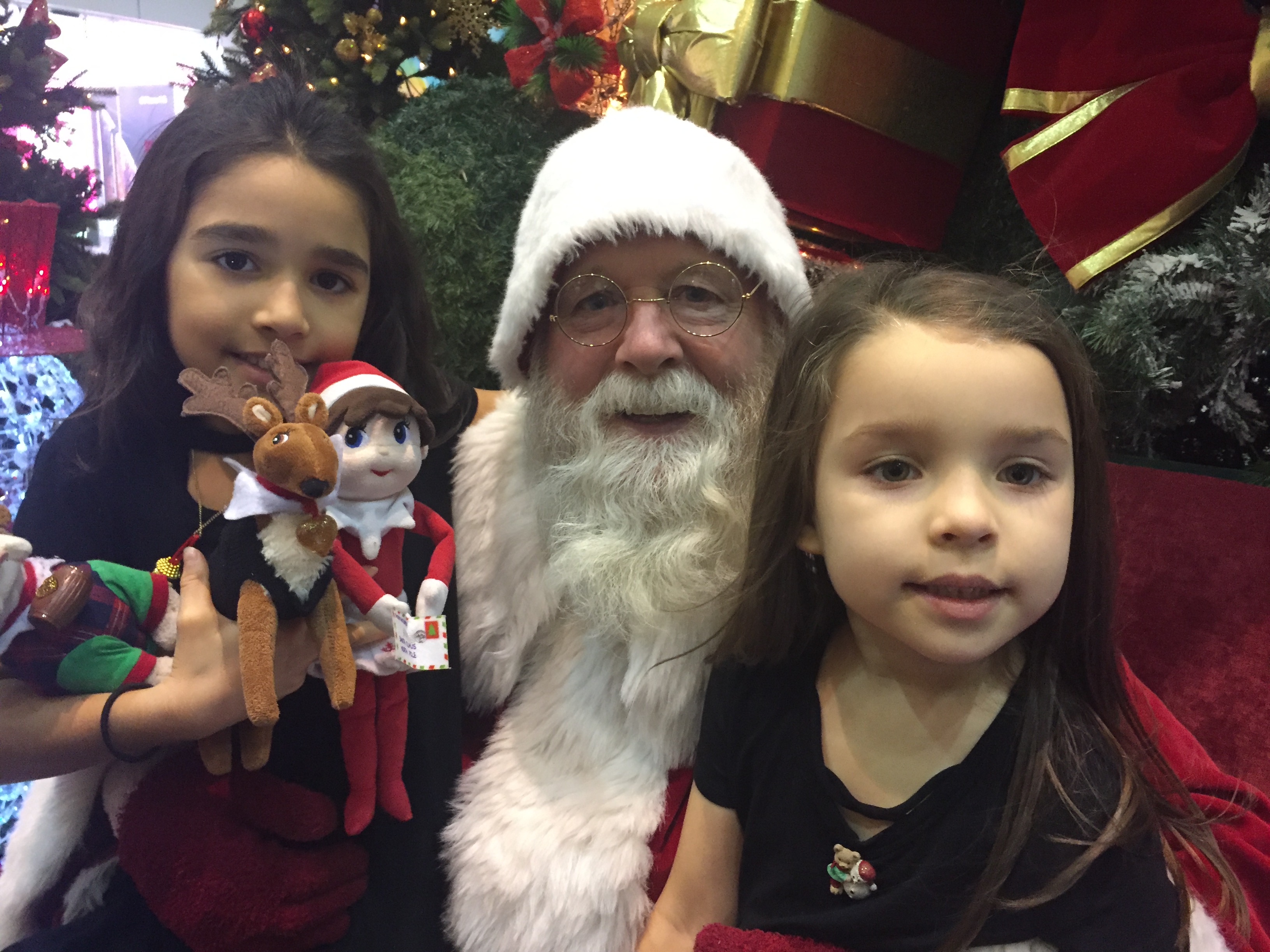 Tom as Santa with children