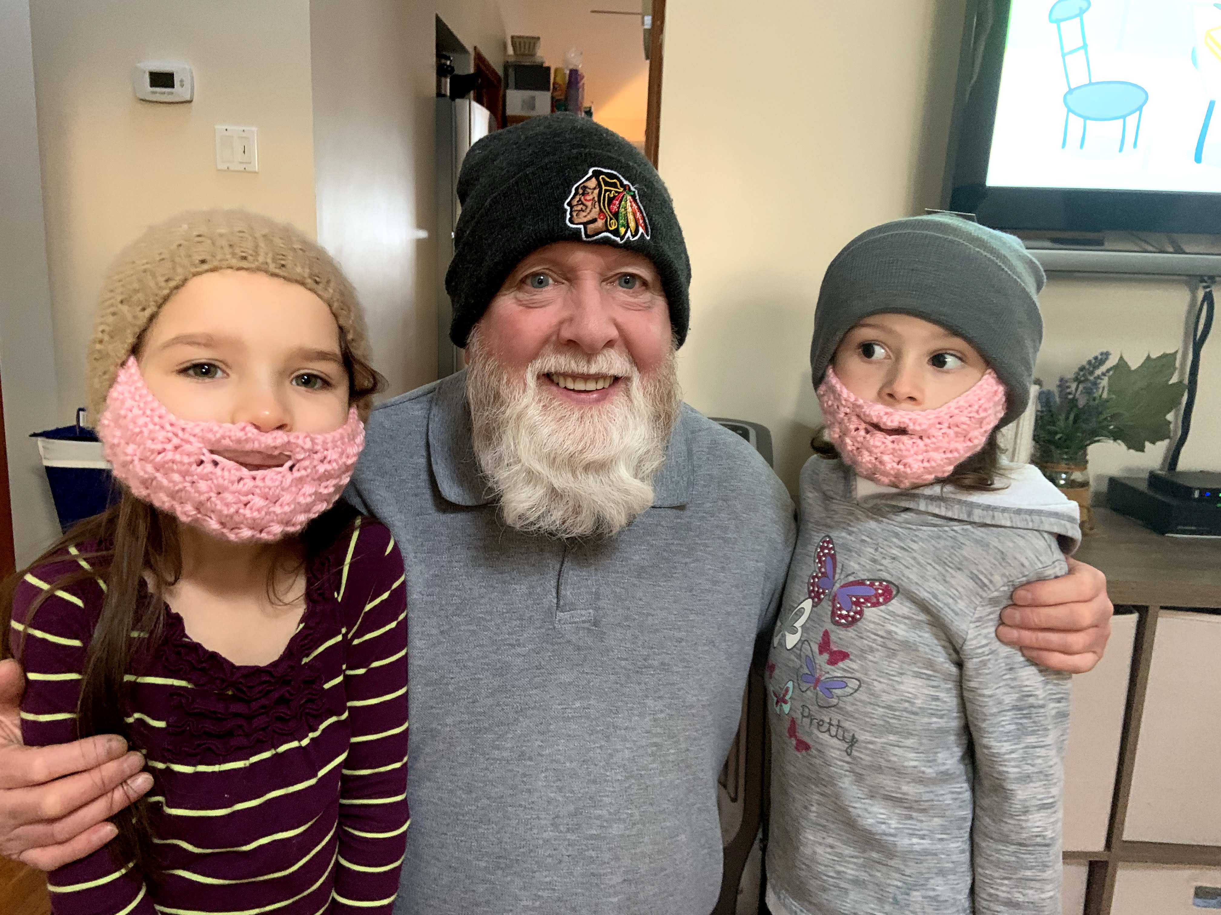 Tom as Santa with two children